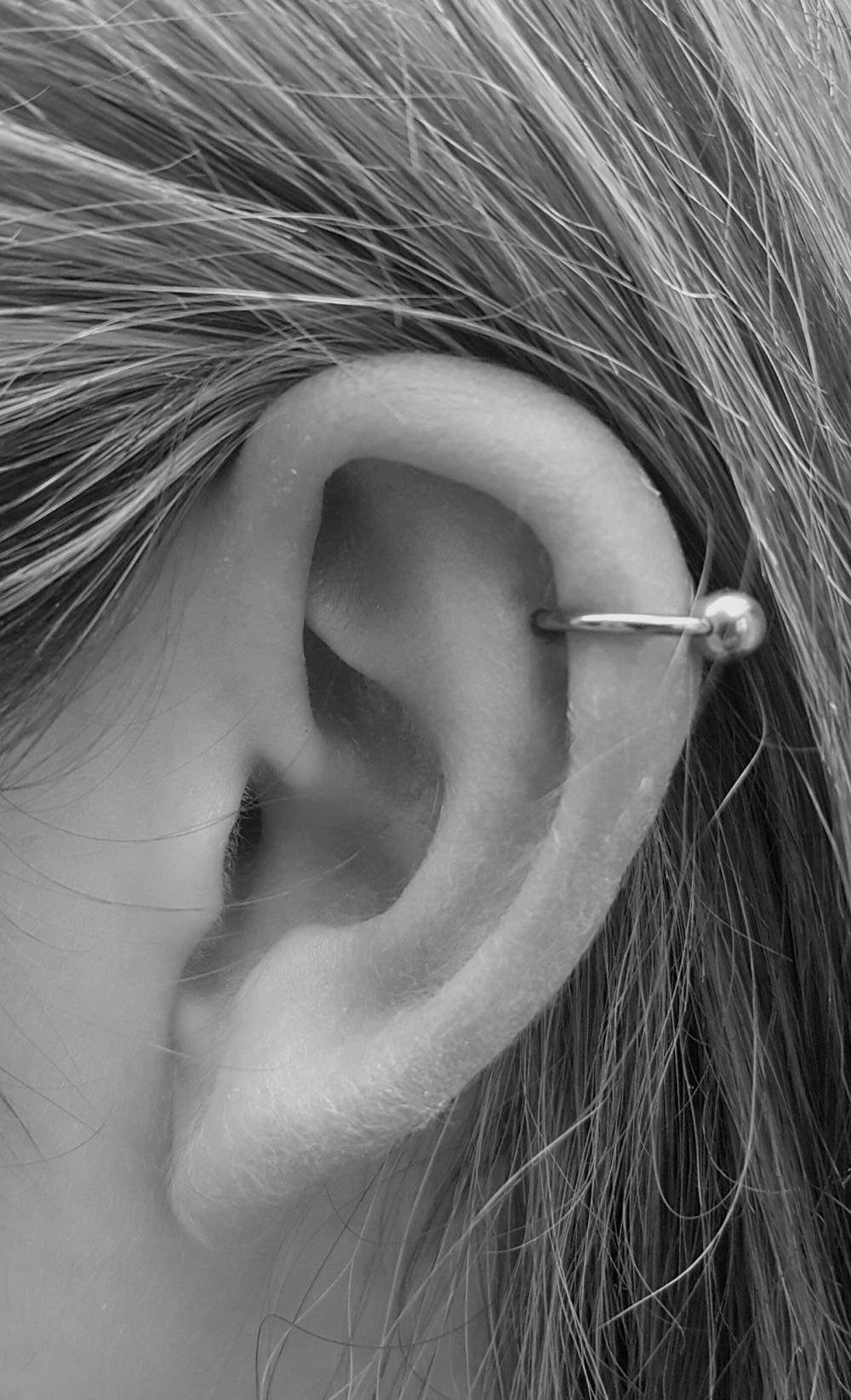Piercing oreille Relief tattoo